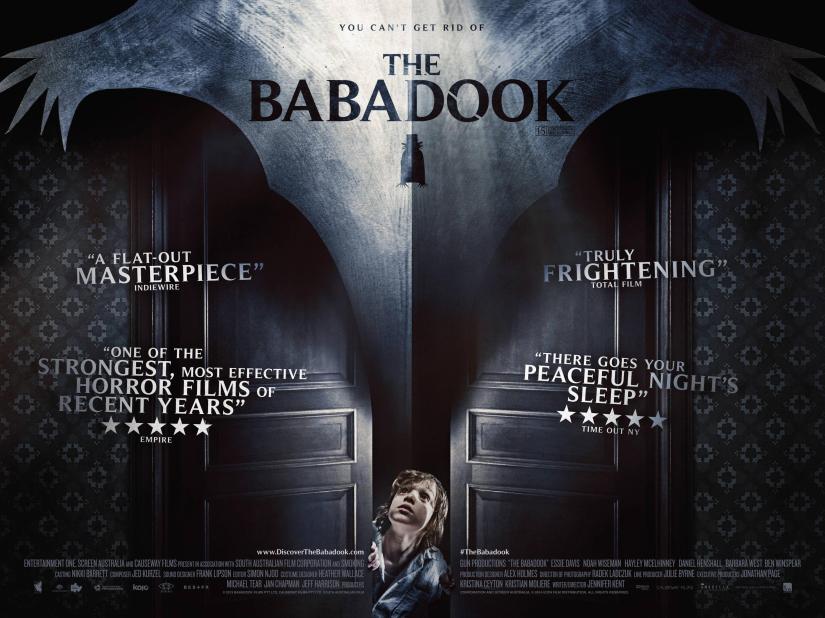 Babadook Movie Poster Text reads The Babadook, image of a child in doorway with looming presence above him.