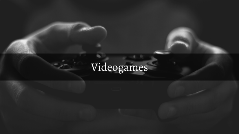 Blog Header: Videogames
Image: a game controller held in hands