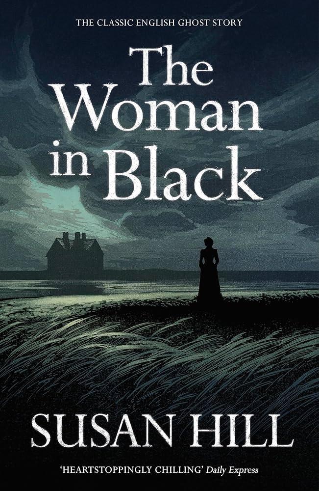 Woman in Black Book cover, a drawn image of an isolated house with a woman standing alone and staring at the house.